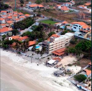 an aerial view of a city with a beach and buildings at Apto Praia do Meio in São José de Ribamar