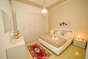 En eller flere senge i et værelse på Case Vacanze Terra Sinus