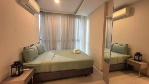 Katil atau katil-katil dalam bilik di Lovely Condo-BTS Thong Lo 5mins