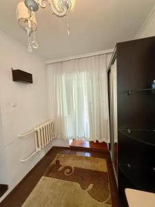 TV a/nebo společenská místnost v ubytování Одноместный номер на ключ в хостеле Single Hostel Room