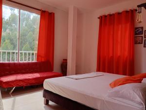 Postel nebo postele na pokoji v ubytování Hotel Taganga Dive Santa Marta