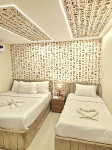 Letto o letti in una camera di Miami Pyramids View