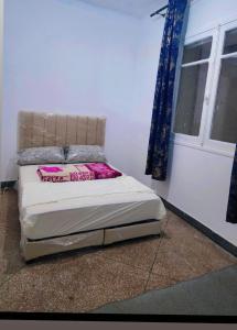 Ένα ή περισσότερα κρεβάτια σε δωμάτιο στο Hachem