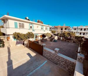 an overhead view of a building with a courtyard at Levante Apartment for 4 in Faliraki