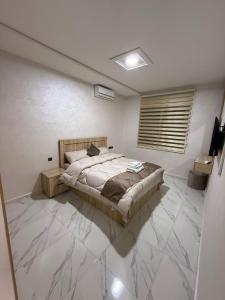 Postel nebo postele na pokoji v ubytování Appartement internationale