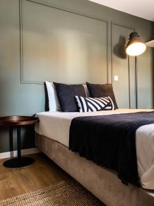 Cama ou camas em um quarto em Casa do Museu