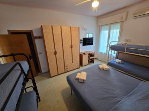 Postel nebo postele na pokoji v ubytování Hotel Rosa
