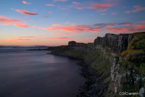 una vista de un gran cuerpo de agua al atardecer en Beinn Edra House B&B, en Staffin