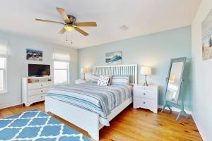 Ένα ή περισσότερα κρεβάτια σε δωμάτιο στο Sun Haven