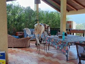 Balkón nebo terasa v ubytování Villa appartamento e piscina anche esclusiva parco del cilento