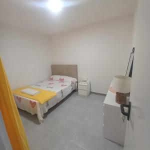 Postel nebo postele na pokoji v ubytování Hiromi Room calle Julio antonio