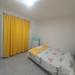 Postel nebo postele na pokoji v ubytování Hiromi Room calle Julio antonio