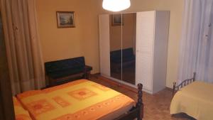 Postel nebo postele na pokoji v ubytování B&B della Pace
