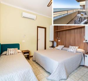Postel nebo postele na pokoji v ubytování Hotel Bamby e Delfino