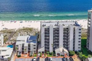 an aerial view of a hotel and the beach at Spacious Beachfront Retreat - Sauna Pools & More in Perdido Key