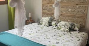 Gite La Tortue Bleue客房内的一张或多张床位