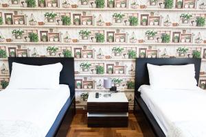 Ένα ή περισσότερα κρεβάτια σε δωμάτιο στο Laetitia Guest House32