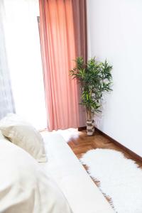Ένα ή περισσότερα κρεβάτια σε δωμάτιο στο Laetitia Guest House32