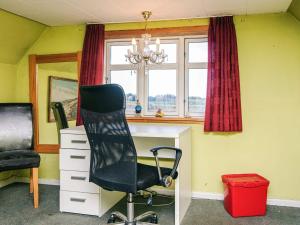 Televiisor ja/või meelelahutuskeskus majutusasutuses 4 star holiday home in Løkken