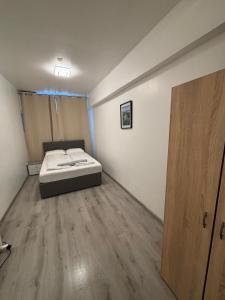 Ліжко або ліжка в номері Hernals Hotel