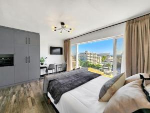 Ένα ή περισσότερα κρεβάτια σε δωμάτιο στο Greenpoint Haven