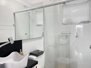 Ένα μπάνιο στο Edifício Residencial | 250m da Praia +12 φωτογραφίες