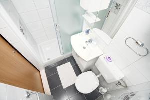 Ванная комната в Apartments by the sea Zivogosce - Blato, Makarska - 24290 +49 фотографий