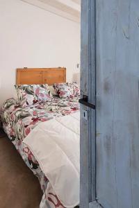 an open door to a bed in a bedroom at El Rancho - Hospedaje Rural in Navarro +27 photos
