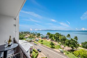 a balcony with a view of the ocean at It's all about the views! in Townsville