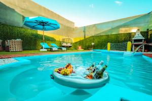 a bowl of food in the water in a swimming pool at Villa Wind in Kaş