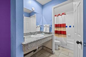 Koupelna v ubytování American Executive Inn Mesa