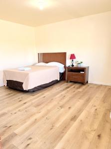Ένα ή περισσότερα κρεβάτια σε δωμάτιο στο Best Budget Inn