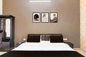 Postel nebo postele na pokoji v ubytování Hotel O IIDM ECO CENTRE + 27 fotografií