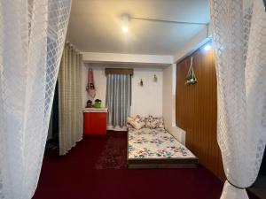Katil atau katil-katil dalam bilik di Sunset nest Lillus apartment