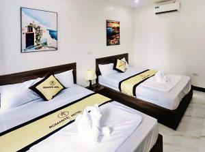 Ένα ή περισσότερα κρεβάτια σε δωμάτιο στο Romantic Hotel - C603A Flamingo Ibiza Hải Tiến