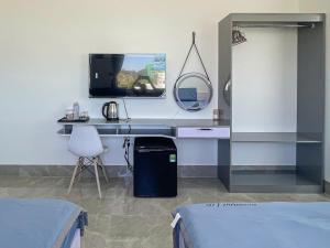 Μια τηλεόραση ή/και κέντρο ψυχαγωγίας στο Homestay Bình Râu