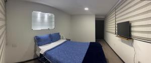 Postel nebo postele na pokoji v ubytování Hotel Dorado - Cerca al Aeropuerto - Habitación 401