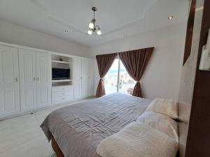 Rúm í herbergi á Casa el Roble Oeste, Minimalist