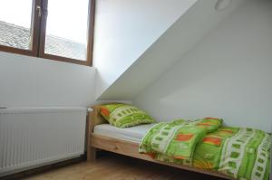 Postelja oz. postelje v sobi nastanitve Guest House Anna Caffe