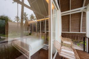Balkón nebo terasa v ubytování Hotel Lumi Gili Trawangan