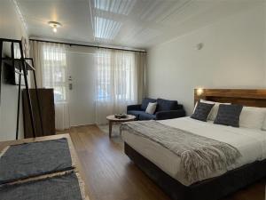 Postel nebo postele na pokoji v ubytování Taft Apartments