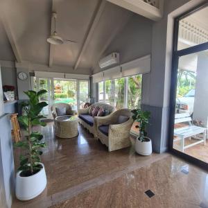 โรงแรม ริเวอร์บรีซ เชียงแสน River Breeze Chiangsean的休息区