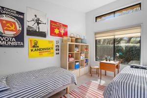 Χώρος καθιστικού στο Aqua Beach House +5 φωτογραφίες
