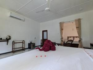 Letto o letti in una camera di Sigiriya Dreamscape Villa