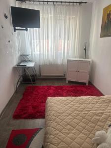 TV a/nebo společenská místnost v ubytování Ingrid home 3 camere