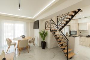 Kuchyň nebo kuchyňský kout v ubytování BEQUEST Corinthian Luxury suites