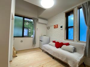 Postel nebo postele na pokoji v ubytování 大久保駅前 - 新宿直通 - 快適で静かな和風住宅 - ヒサカタ ライト