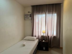 Voodi või voodid majutusasutuse Soi Suites toas