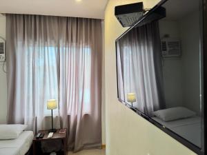 Voodi või voodid majutusasutuse Soi Suites toas