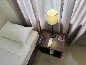 Voodi või voodid majutusasutuse Soi Suites toas